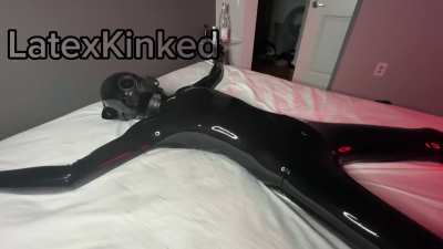 Shiny kitty femboy teased in rubber bondage gif