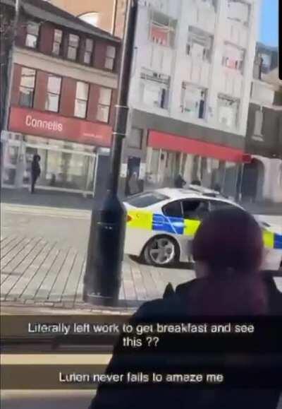 Stealing a police car and mooning out the window