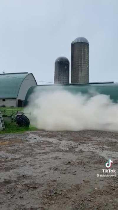 an old silo collapsing