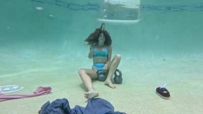 Nathalia speaks underwater