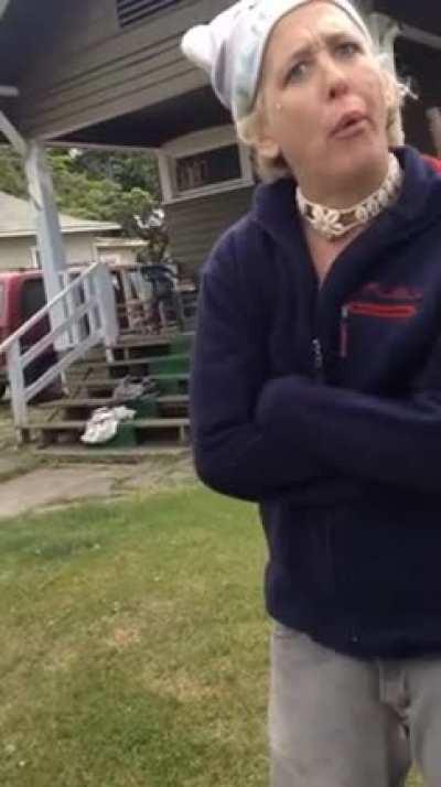 Insane women has interesting conversation with a fellow citizen.