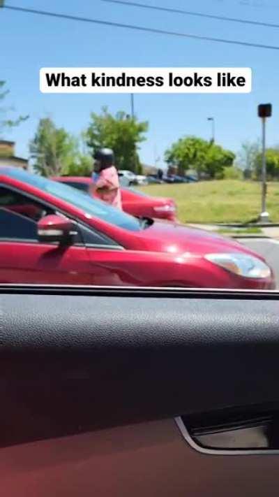 This guy was just hit by a car while riding his motorcycle. In one of the most incredible displays of kindness, rather than freak out at the driver, his first instinct was to go over and console the young woman who was visibly shaken from the experience