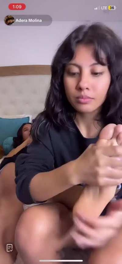 Friend gives foot massage on live