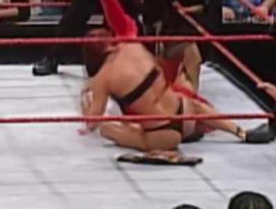 Lita getting ragdolled and stripped to her thong