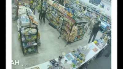 Armed robber taken down by thieves