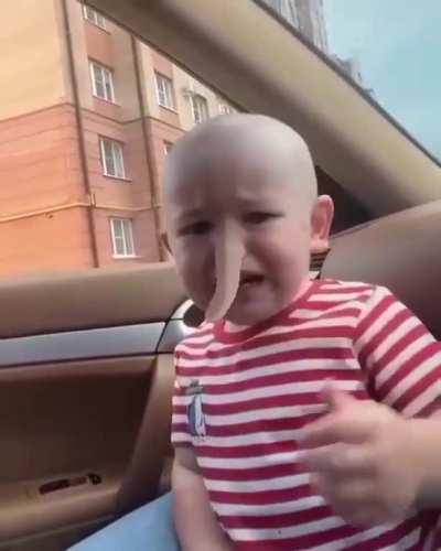 Kid afraid of being Pinocchio the second.