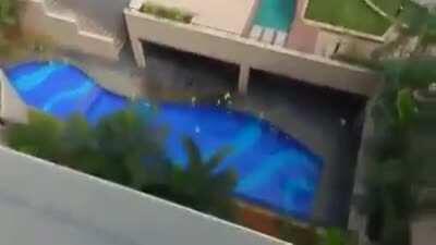 Insane roof jump into pool