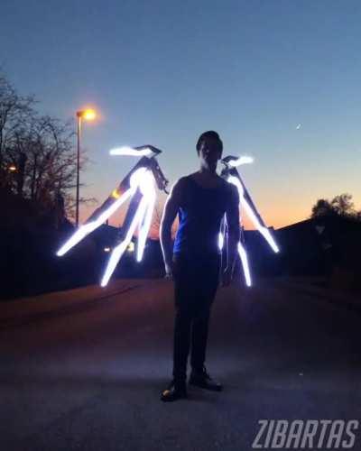 My animatronic Mercy wings (from Overwatch) are almost done after 9 months of work! I built them from metal and they get pretty bright!