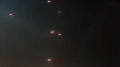 Rocket barrage launch + interception (Hamas fires at lsraeli cities, interception by Iron Dome, 2021)