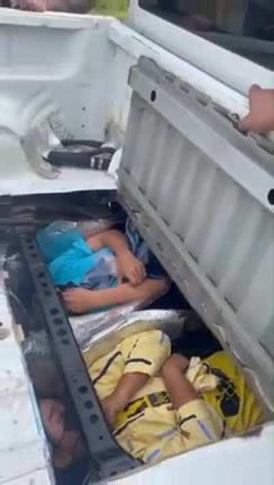 to hide people in a pickup truck (by people smugglers, in Thailand)
