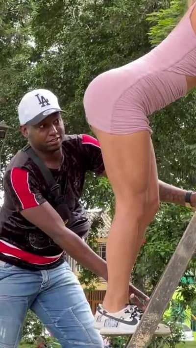 Beautiful Blonde Climbs Stairs in a skirt and teases men