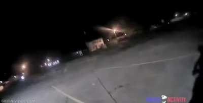 Cop runs up and kicks a guy in the face after he already surrendered and was being detained