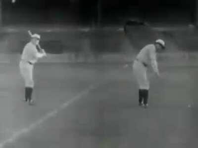 Babe Ruth teaches ladies how to play ball.