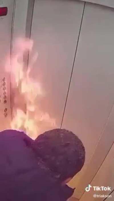 WCWG lighting a glass of alcoholic drink in an enclosed space