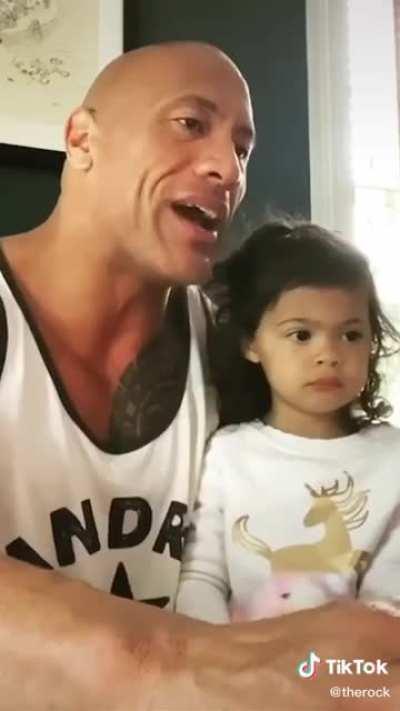 The Rock dying inside, because his daughter still doesn't believe him.