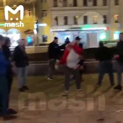 To kick the dude in grey pants.