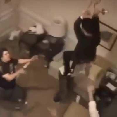 WCGW swinging on a chandelier