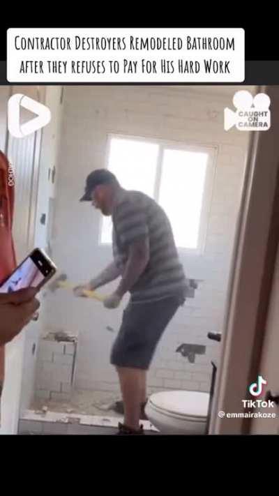 Contractor destroys remodeled bathroom after costumer refuses to pay for his hard wold