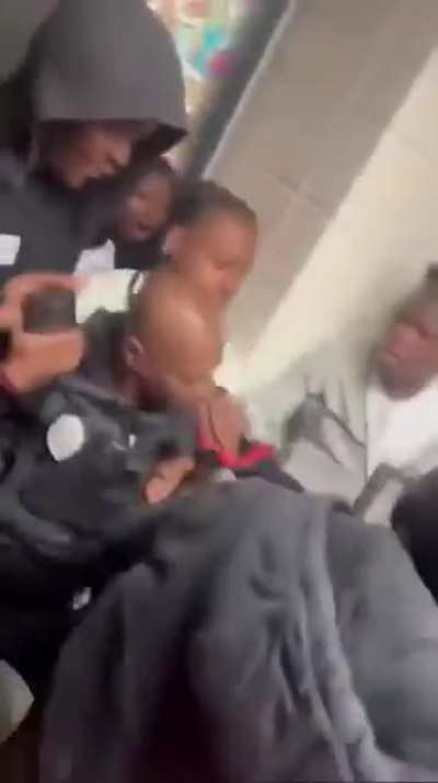 School security guard gets swamped and attacked by students and has to defend himself.