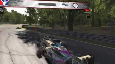 Reversing on the track and killing 3 cars in a roll. This is by far the most ridiculous driving I have ever seen.