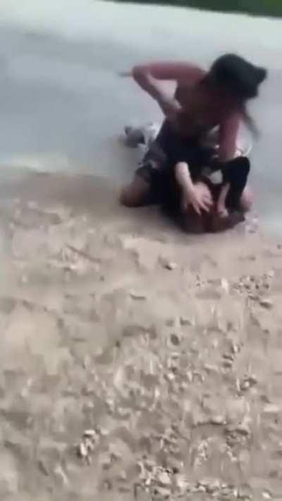 Camo shorts chick dominates the opposition… rough ground & pound