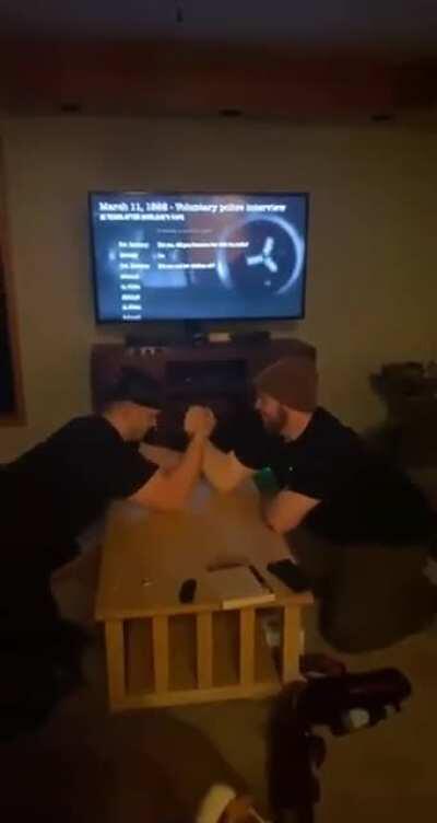 The classic arm wrestling snap.