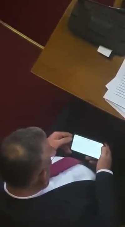 Serbian ruling coalition MP during an important parliamentary debate on Kosovo negotiations