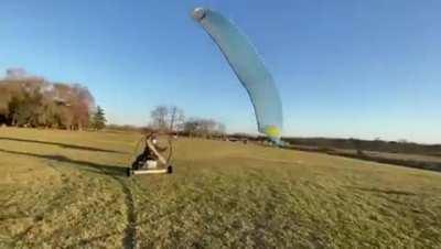 Crashing your motorized glider into a car