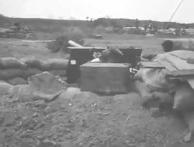 An Indian gun team filmed in action during the Battle of Surabaya in Indonesia (then Dutch East Indies), manning an Ordnance QF 25-pounder field gun, November 1945.