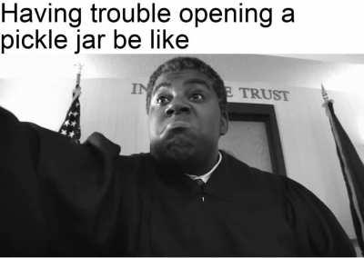 The key is to use a hand towel (or your shirt) to open the jar