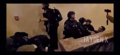 Clearest view of a terrorist attempting to breach the barrier behind which the VP, VP-Elect, Senators, Congresspeople, and staffers were.