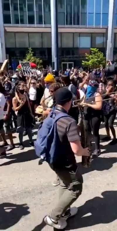 People playing music and dancing so cops tear gas them.