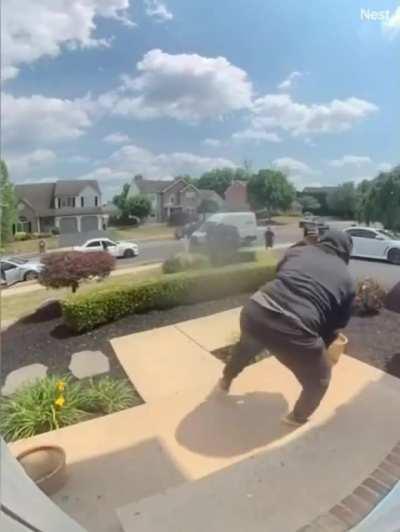 Porch Pirating is getting competitive - two thieves try to claim the same package seconds after it was delivered 