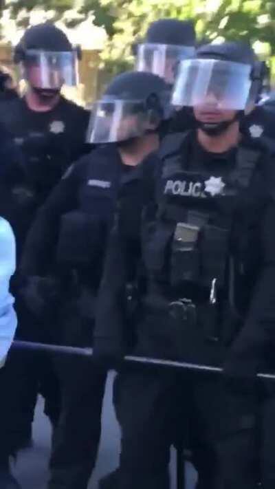 Cop decides to shoot at protestor who hurt his ego by yelling 'F**k You' at him