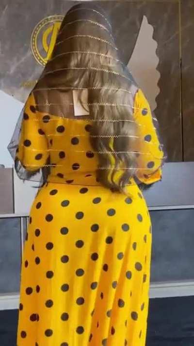 I love subtle booty in loose, free-flowing dresses...