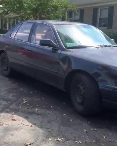 Nazi trash shows off her swastika tattoo.