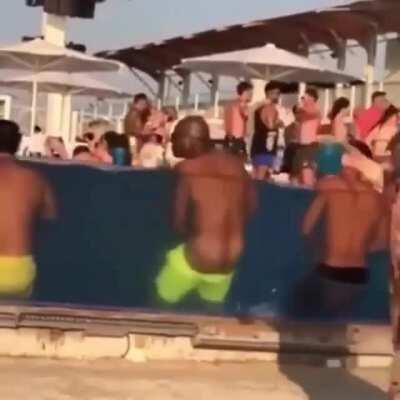 Dude trying to bust a quick one in the pool