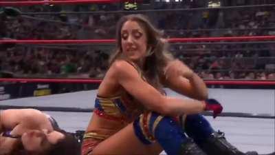Poor Kayla Sparks suffers the lockjaw courtesy of Britt Baker, DDS