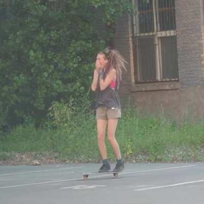 Her excitement over her first kickflip after practicing it for a long time