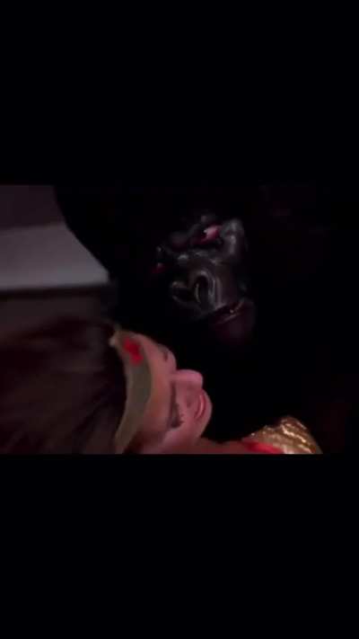 Lynda Carter as Wonder Woman getting bearhugged