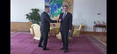 The awkward “handshake”