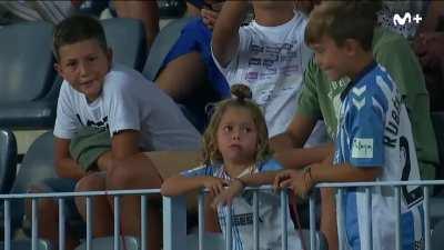 Malaga mascot doesn't high-five a little girl