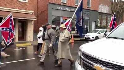 Various Confederate groups (Sons of Confederate Veterans / Virginia Flaggers) are marching through Lexington, Virginia