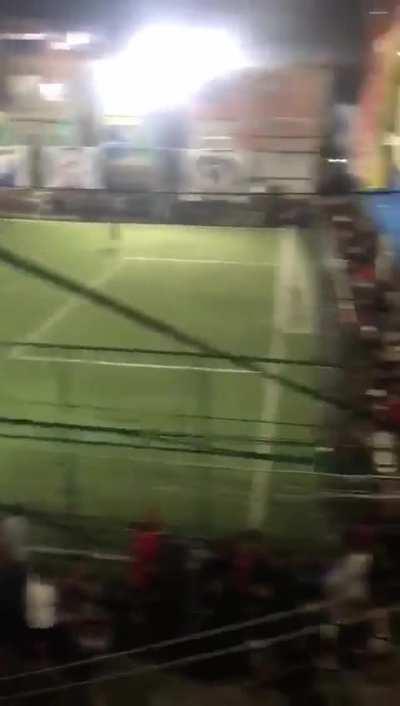 Football match in the Penha favela, Brazil