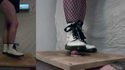 Cock reduced to nothing under wife's Doc Martens, she just giggles at my pain