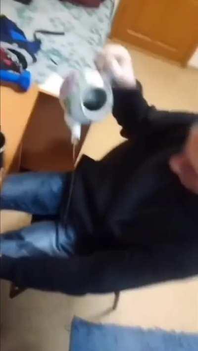 Russian man tries to pour tea