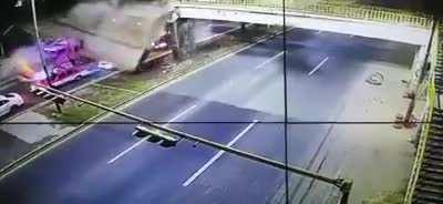 WCGW - Driving a truck with the dump box lifted.