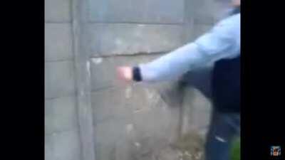 Kicking a concrete wall