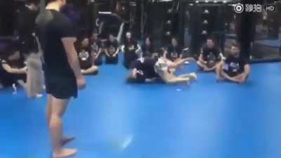 Inexperienced man tested if he could hold Zhang Weili down or take her down - he failed in both occasion