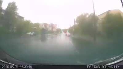 10 years old boy in Russia, drives a car with his 4 years old sister